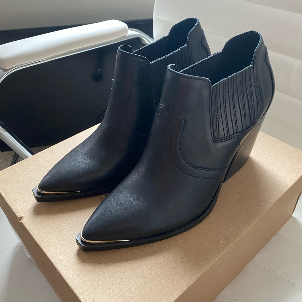 NWOT Steve Madden Booties in box. Size 7 but could fit 6.5 with thicker sock.